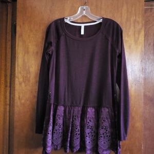 Beautiful lace long sleeved top with laced sides.